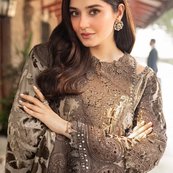 Maria B designer dress featuring luxury lawn, intricate embroidery, and modern cuts – top Pakistani fashion brand in the UK.